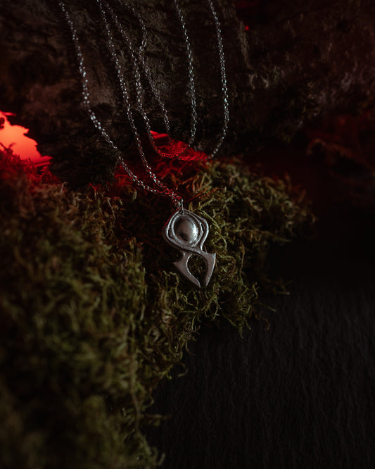 Silver necklace pendant inspired by the Horadrim from the Diablo games
